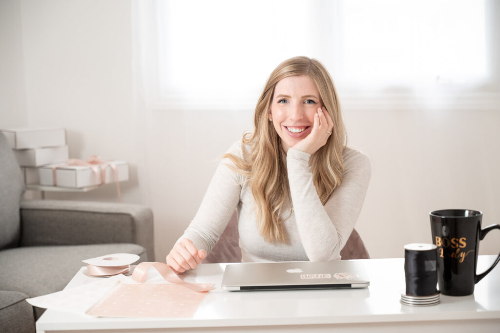 Entrepreneur smiling during relaxed brand photoshoot