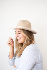 Image of a woman laughing in her lifestyle branding photoshoot.